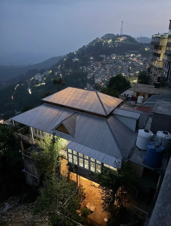 Mehtab Lodges at dusk, overlooking the hillside town of Murree